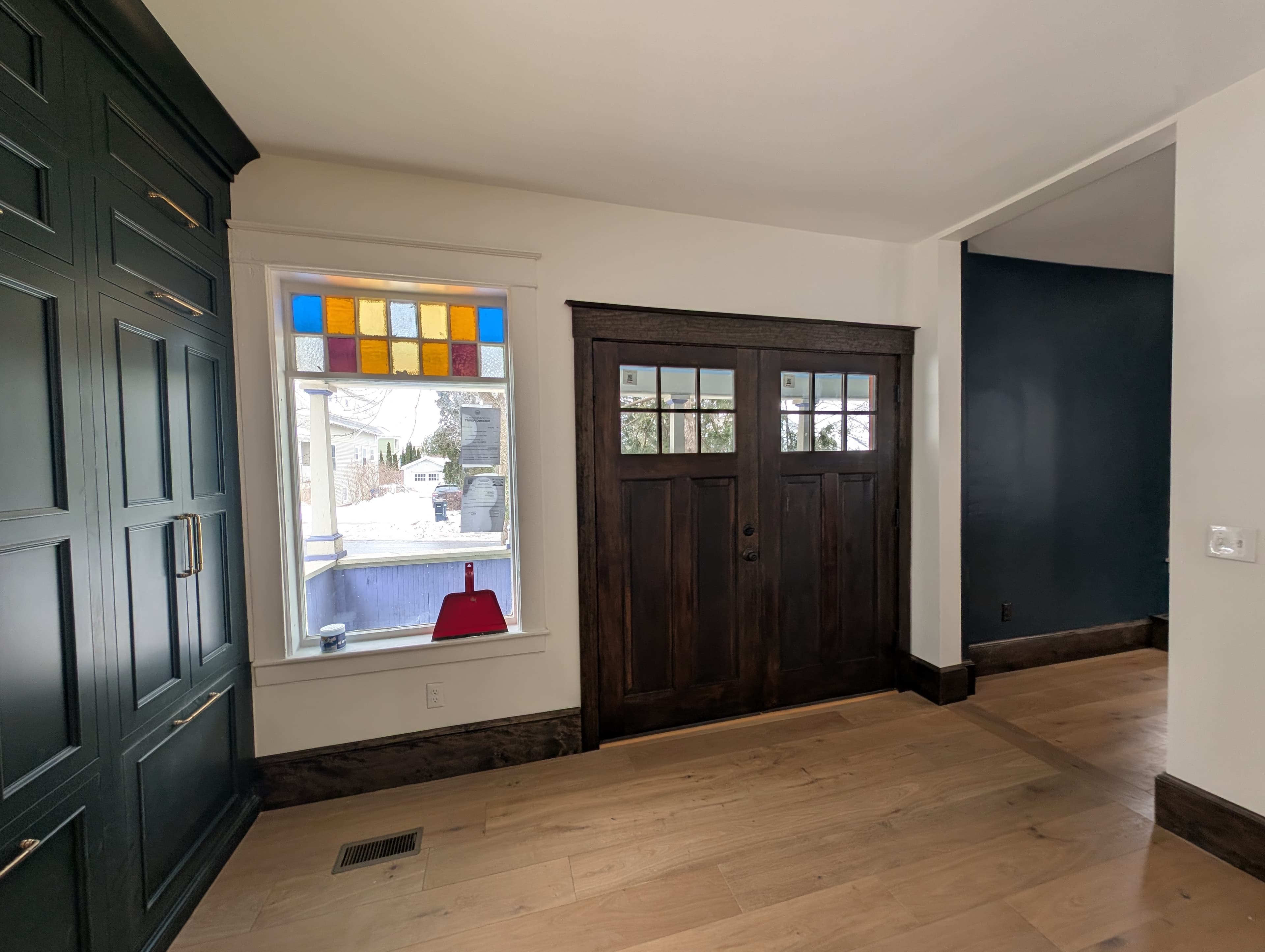 Custom cabinetry and craftsman entry remodel by Pro-Tech Contracting in Burlington VT