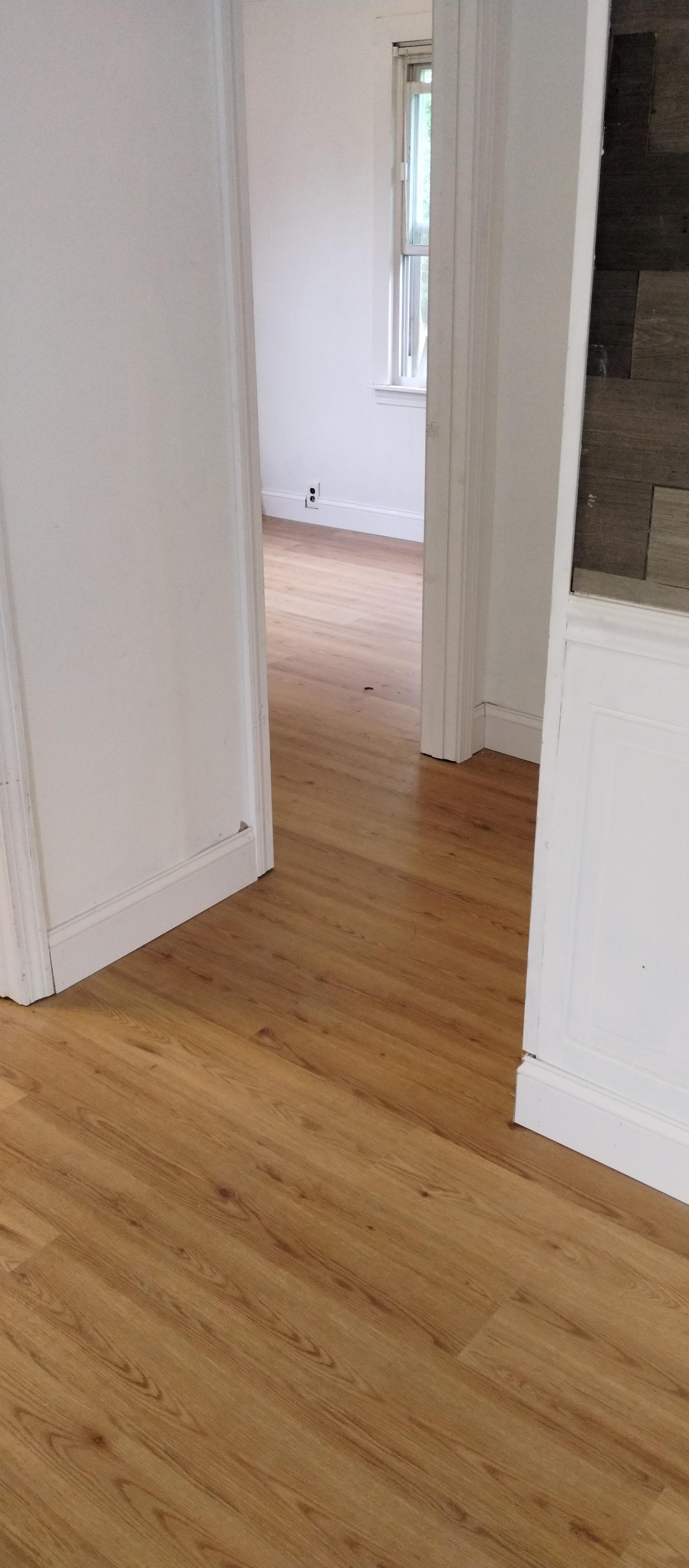 New wood flooring installation by Pro-Tech Contracting